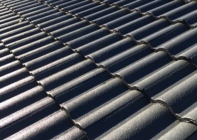 Clean, freshly painted and restored roof at Oxenford on the Gold Coast, using colour Woodland Grey